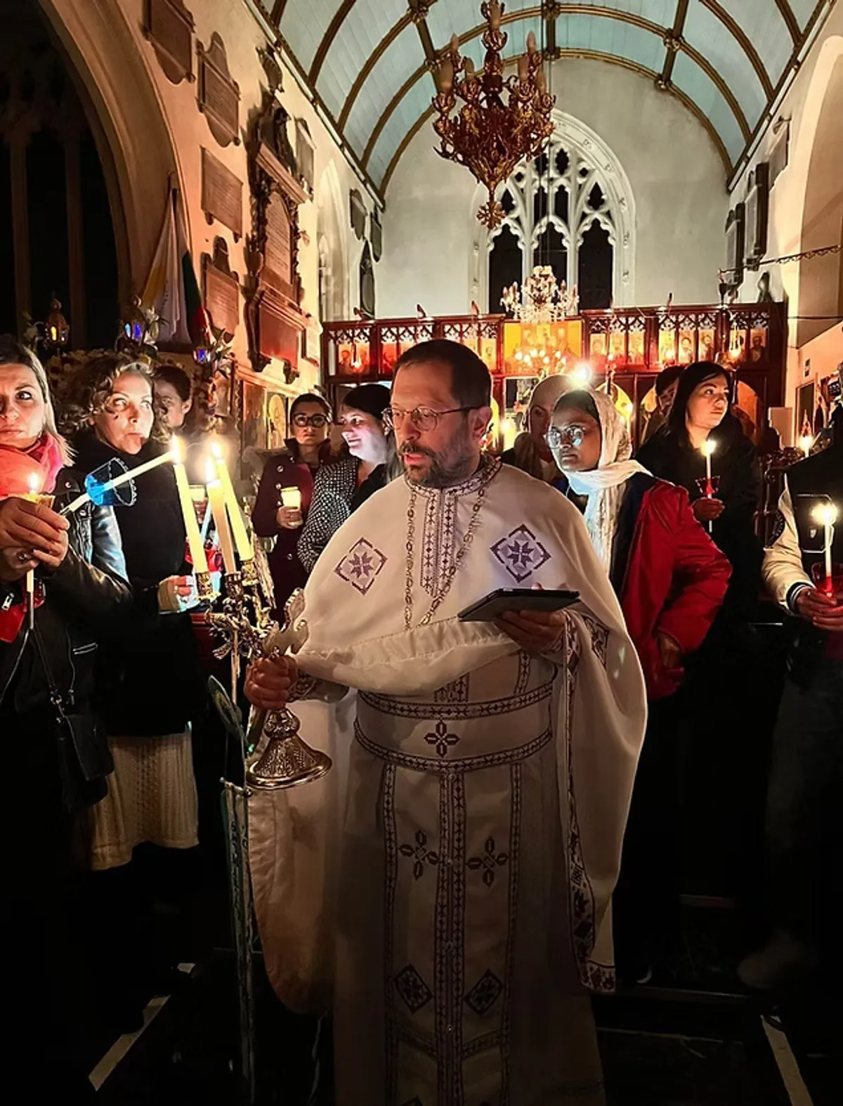 Fr Trayan and the parish community